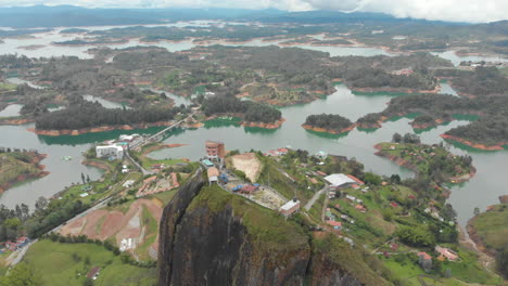 Aerial-view-of-the-Piedra-del-Penol-rock-in-Guatape,-Colombia-during-Daytime-