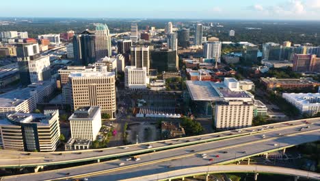 4K-Aerial-push-in-clip-over-the-408-Expressway-and-into-downtown-Orlando,-Florida