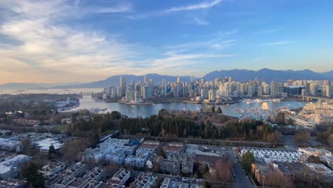 Aerial-sunset-holy-grail-time-lapse-of-Vancouver-cityscape-Canada,-big-metropolis-urban-modern-futuristic-skyline-Timelapse