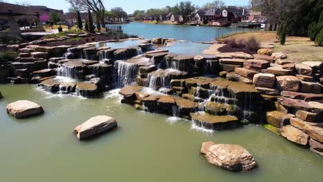 Aerial-video-slowly-approaching-rock-formation-at-the-Riverwalk-in-Flowermound-Texas
