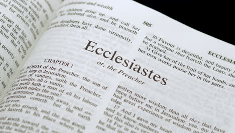 Close-Up-Shot-of-Bible-Page-Turning-to-the-book-of-Ecclesiastes