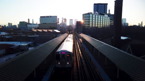 Subway-Train-Pulling-Into-City-Station-Early-Morning