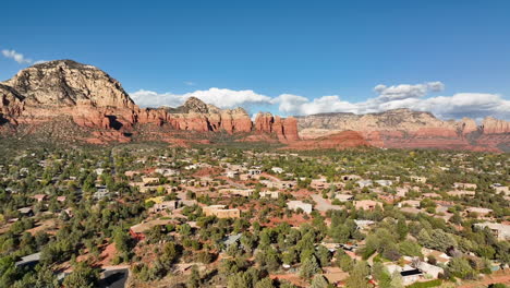 Rotating-cinematic-drone-shot-of-mountains-and-houses-in-Sedona-Arizona