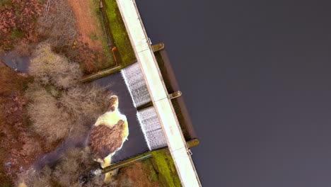 Aerial-Birds-Eye-View-Over-Road-On-Encoro-de-Villasenin-Reservoir