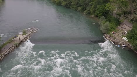 Weir-on-Reuss-River-in-Bremgarten-Switzerland-creates-surfing-wave