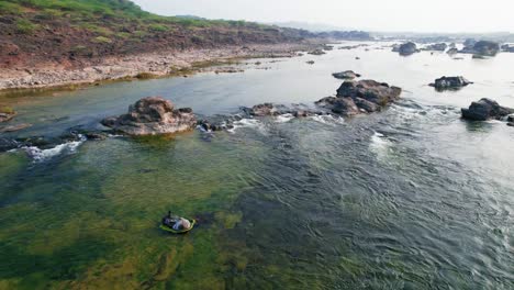Aerial-drone-rotating-shot-over-Narmada-river-valley-in-Vadodara-region,-Gujrat,-India-beside-at-daytime