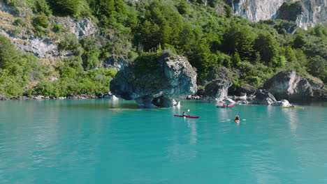 Kayakers-Exploring-Marble-Cathedral-Caves-On-Lake-General-Carrera