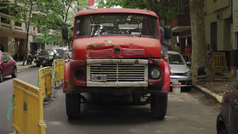 Gimbal-walking-towards-old-rusty-truck-parked