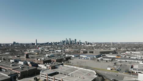 push-in-aerial-drone-shot-of-the-downtown-Minneapolis-skyline,-in-the-Twin-Cities-of-Minnesota
