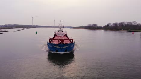 Aerial-Flying-In-Front-Of-Forward-Bow-Of-Torpo-Cargo-Ship-Along-Oude-Maas-On-Overcast-Day-With-Parallax-Right-View
