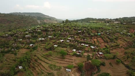 Spectacular-aerial-of-traditional-african-Konso-village-on-mountain,-Omo-Valley,-Ethiopia