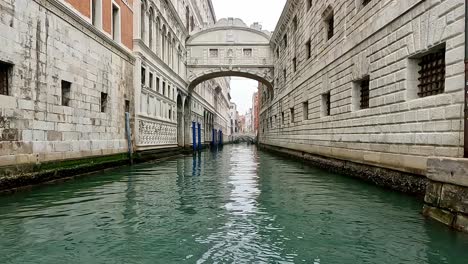 Low-angle-unusual-pov-of-Ponte-Dei-Sospiri-or-Bridge-of-Sighs,-Venice-in-Italy