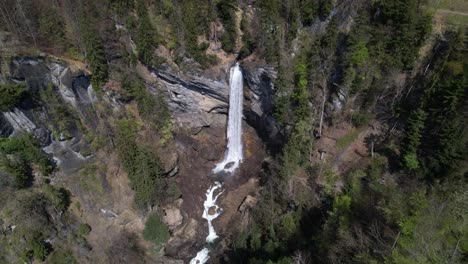 Berschnerfall-waterfall-in-Switzerland,-high-angle-drone-view-4k