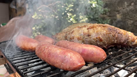 slow-motion-scene-of-meat-cutting-and-raw-sausages-put-on-the-grill