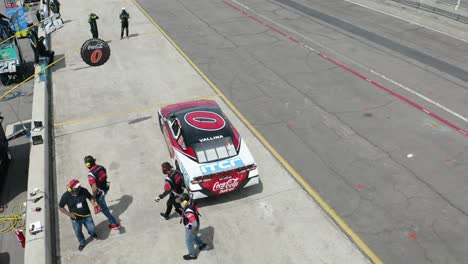 Racing-team-working-at-pit-stop,-Mexico-NASCAR-Formula-one-racing-competition