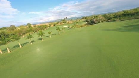 Crazy-drone-flying-pov-over-Vistas-Golf-and-Country-Club,-Santo-Domingo-in-Dominican-Republic
