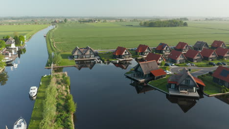 Tranquil-Scenery-At-Waterstaete-Ossenzijl,-Holiday-Resort-Waterstaete,-Ossenzijl,-The-Netherlands---aerial-drone-shot
