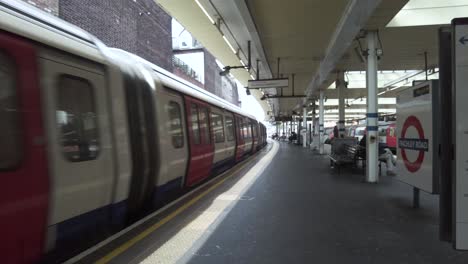 Met-Line-Train-At-Finchley-Road-Station-Departing-Platform-On-12-May-2022