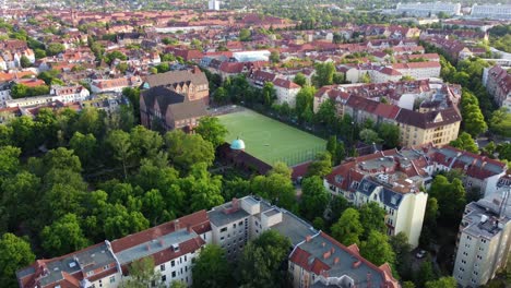 German-school-with-large-soccer-field-in-the-city-Beautiful-aerial-view-flightpanorama-overview-drone-footage-of-Berlin-Friedenau-Summer-2022-Cinematic-view-from-above-Tourist-Guide-by-Philipp-Marnitz