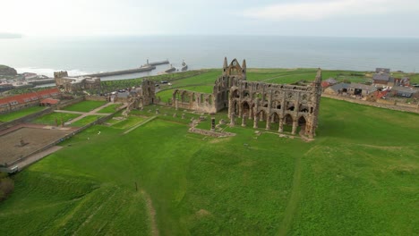 Aerial-View-Of-Whitby-Abbey-With-Green-Lawn-In-North-Yorkshire,-England,-UK