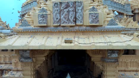 Close-up-shot-of-the-stone-murti-of-god-sculpted-in-the-wall-of-the-the-mandir