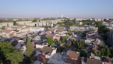Tilt-Aerial-Drone-Shot-Of-Brit-Kehuna-Neighborhood-Netivot,-Israel
