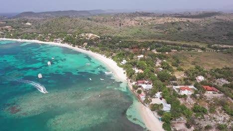 Aerial-View-Of-Coastal-Fishing-Village-At-Playa-La-Ensenada-In-Punta-Rucia,-Dominican-Republic