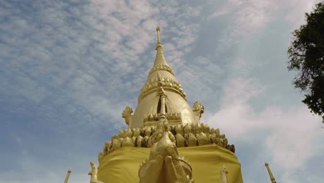 Cloudy-sky-with-golden-roof-of-Thai-Buddhist-temple-in-Koh-Samui