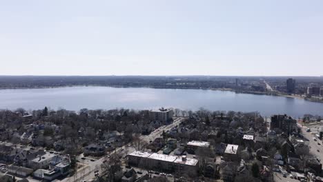 push-in-drone-aerial-shot-of-a-lake-in-the-spring-time-in-minnesota