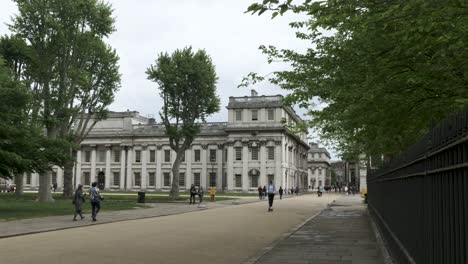 An-establishing-shot-of-the-historic-Old-Royal-Naval-College-in-Greenwich,-a-World-Heritage-Site-recognised-for-its-beautiful-architecture,-London,-England