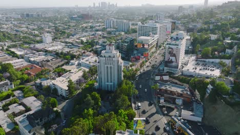 Aerial-Shot-Over-The-Sunset-Strip,-Drone-Above-Famous-Busy-Street-on-Sunny-Afternoon