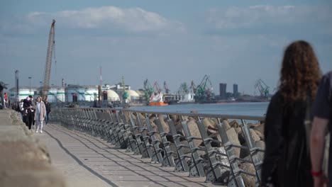 Familes-Taking-a-Walk-on-Stone-Pier-in-Klaipeda-near-Melnrage-Beach