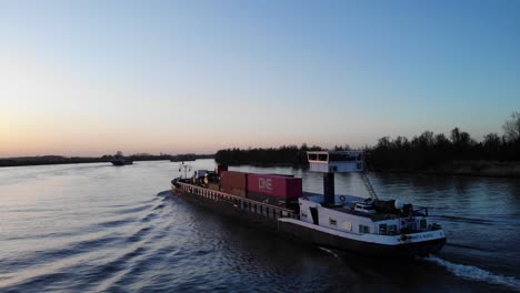 Large-Barge-Transporting-Cargo-On-Oude-Maas-In-Netherlands
