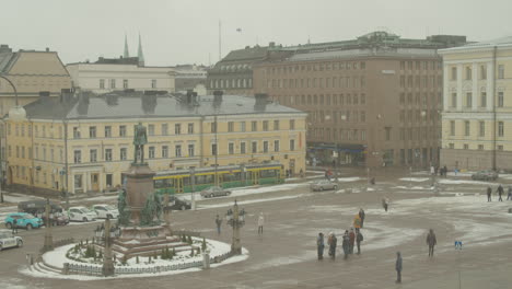 Panorama-view-of-Senate-Square-and-statue-of-Emperor-Alexander-II-in-front-of-Helsinki-Cathedral-on-a-cold-winter-day