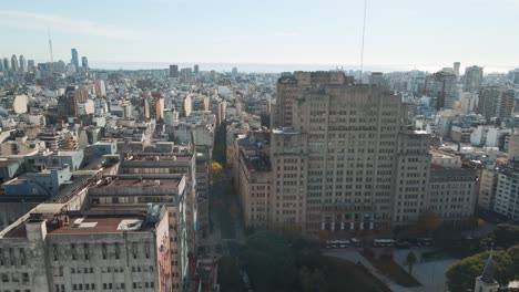 Aerial-dolly-left-of-Clinic-Hospital-and-renowned-public-Faculty-of-Medicine-in-Houssay-Square,-Buenos-Aires
