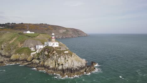 Baily-Lighthouse-In-Howth---Lighthouse-On-The-Southeastern-Part-of-Howth-Head-In-County-Dublin,-Ireland---aerial-shot