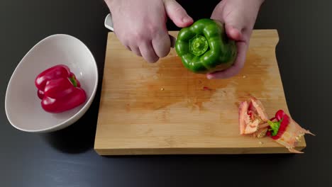 Chef-Removing-Seeds-Of-Green-Bell-Pepper-Before-Cutting