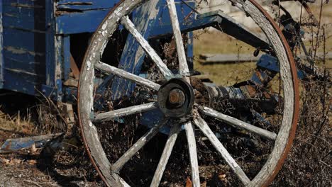 Old-Patinaed-and-rusting-wooden-farm-wagon-wheel