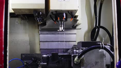 High-tech-machine-manufactures-complex-steel-part-with-advanced-automation-technology,-unique-CNC-machining-mill-wide-shot