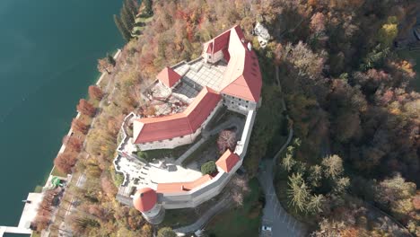 Aerial-rising-over-European-castle-directly-above-Slovenia-sunny-day