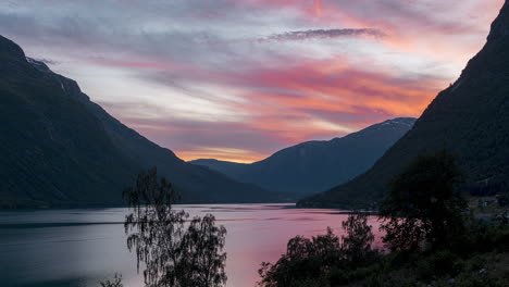 Colorful-Sky-During-Sunset-Over-Fjord-And-Mountains-Near-Leon-Village-In-Stryn,-Vestland,-Norway