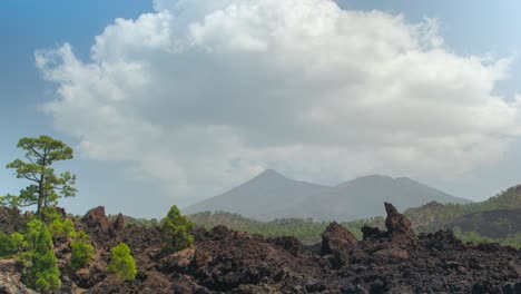 Teide-Volcano-mount-with-white-clouds-rolling-above,-time-lapse-shot