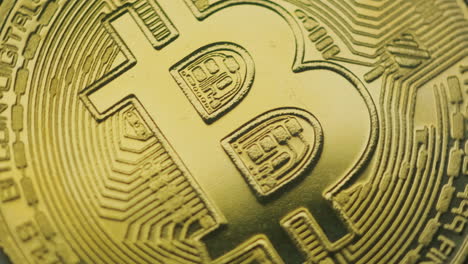 Detail-in-frame-full-of-golden-coin-rotating