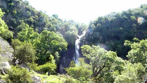 Aber-falls-Snowdonia-mountain-Welsh-national-park-waterfall-people-hiking-wilderness