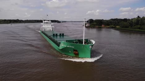 Aerial-View-Of-Forward-Bow-Of-Arklow-Beacon-Moving-Along-Oude-Maas-In-Barendrecht