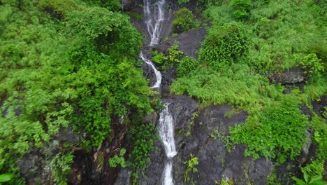 Drone-Shot-of-Beautiful-Waterfall-on-the-hill