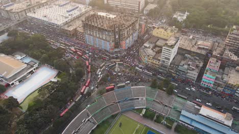 Aerial-Parallax-View-Over-Congested-Traffic-Along-Gulistan-Road-And-DIT-Avenue-Beside-Maulana-Bhashani-National-Hockey-Stadium