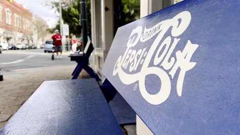 bench-in-front-of-birthplace-of-pepsi-and-pepsi-cola-in-new-bern-nc,-north-carolina