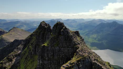 Aerial-View-Drone-Operator-On-Peak-Of-An-Teallach-Mountain-In-Scottish-Highlands