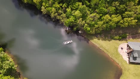 This-is-a-slow-shot-of-a-boat-coming-to-shore-from-a-drone